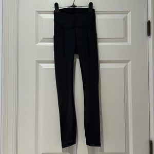 Lululemon Invigorate High-Rise legging. Size 0. Color: Black. NEVER WORN.